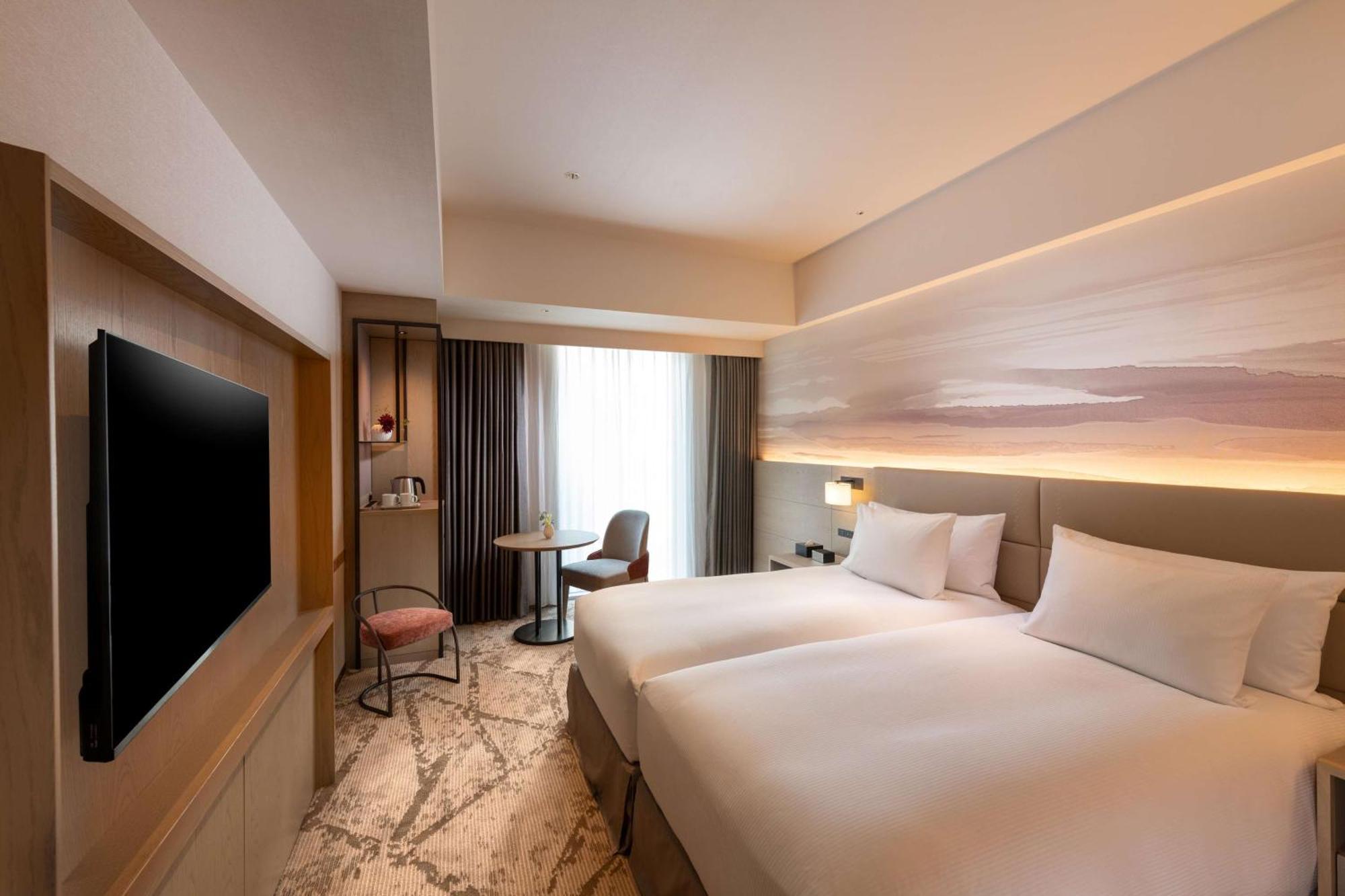 Отель Doubletree By Hilton Тояма Экстерьер фото